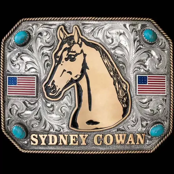 Giddy up & Ride into the sunset with the Woodford Custom Buckle. The large space in the center allows plenty of room for your large Custom Logo, Ranch Brand or any figure to display your style. Detailed with Turquoise stones and 2 American flags. 